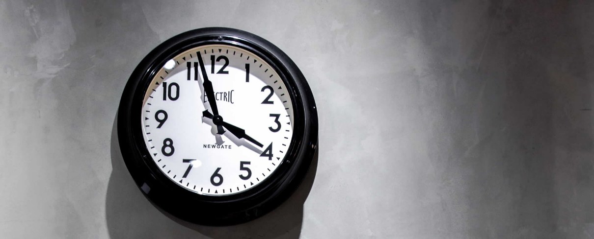 image of a clock representing practice opening hours